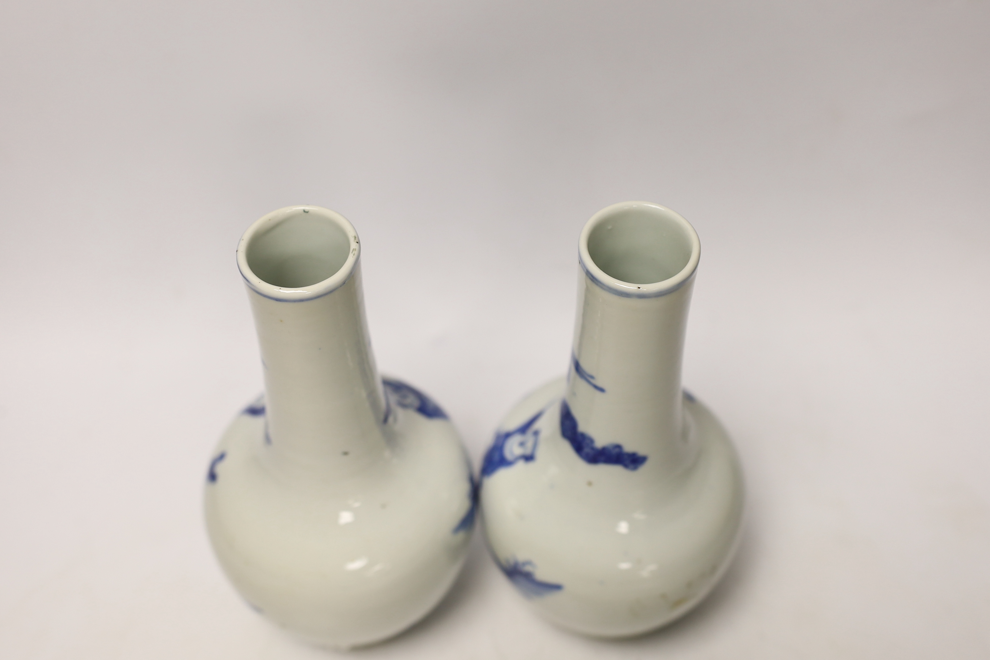 A pair of Chinese blue and white bottle vases, 19th century, 21cm high